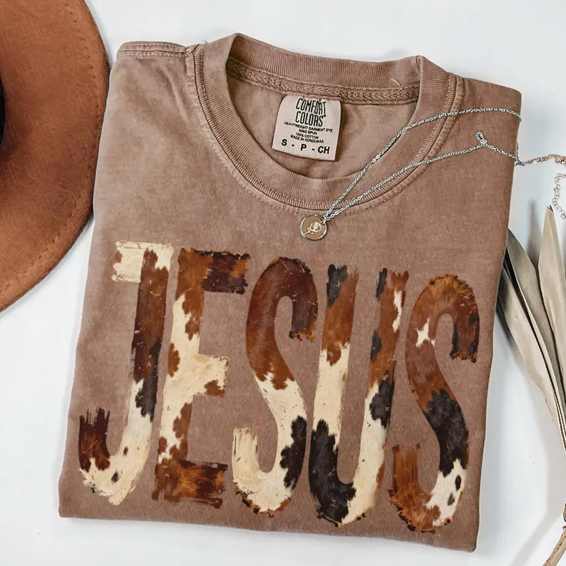 Jesus Faux Cow Hide Tee & Crewneck